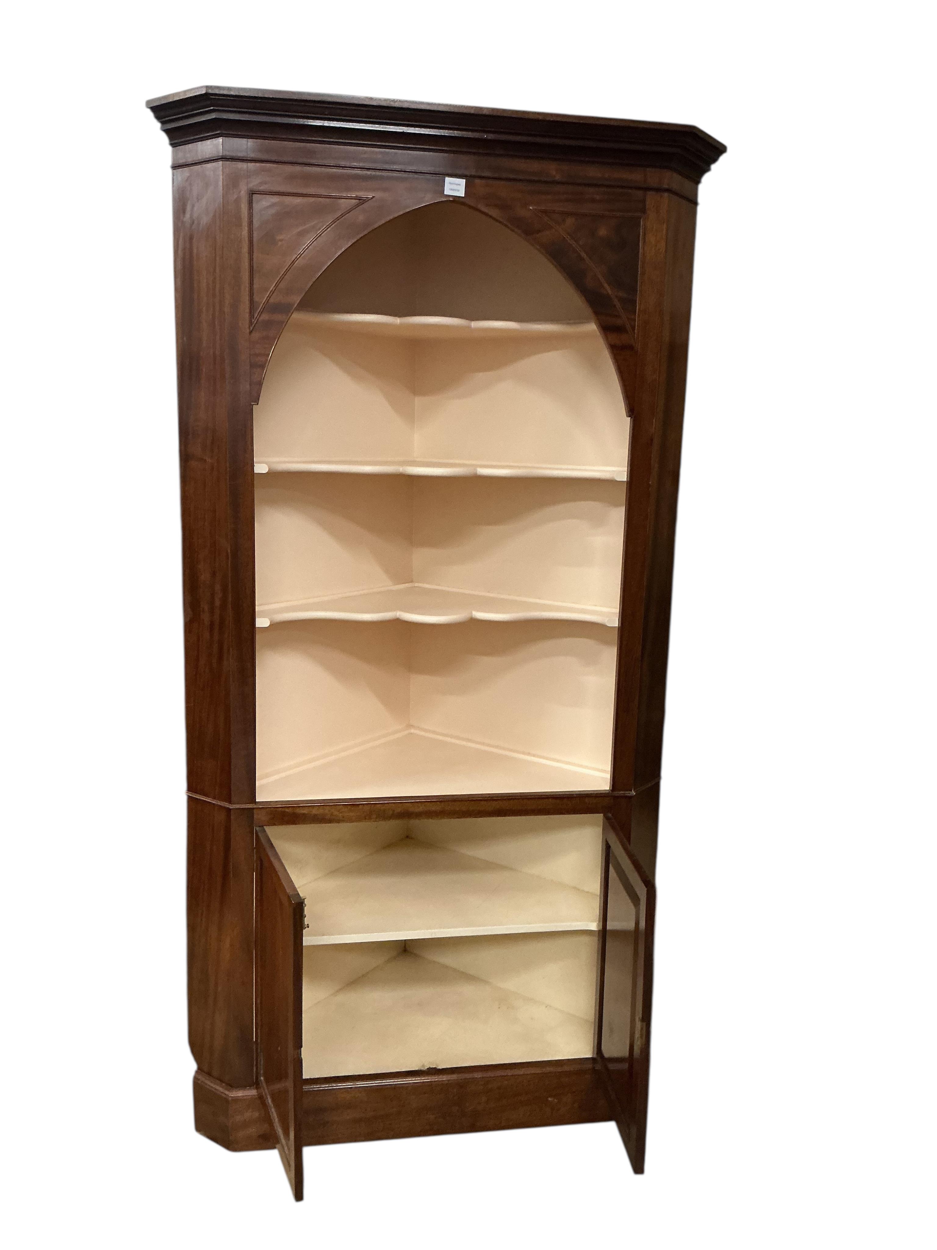 A George III style mahogany standing corner cupboard, width 120cm, depth 60cm, height 223cm